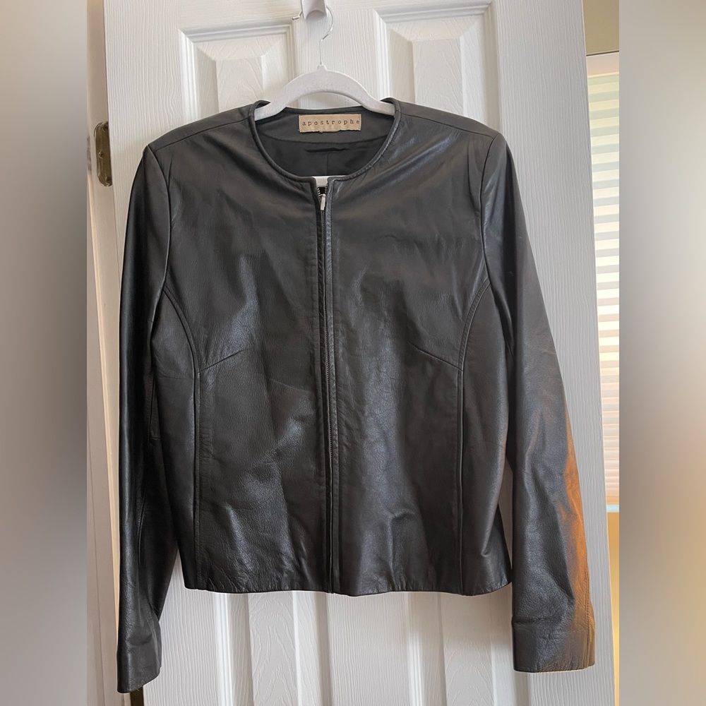 Black quality leather, zip jacket with front slit pocket’s.